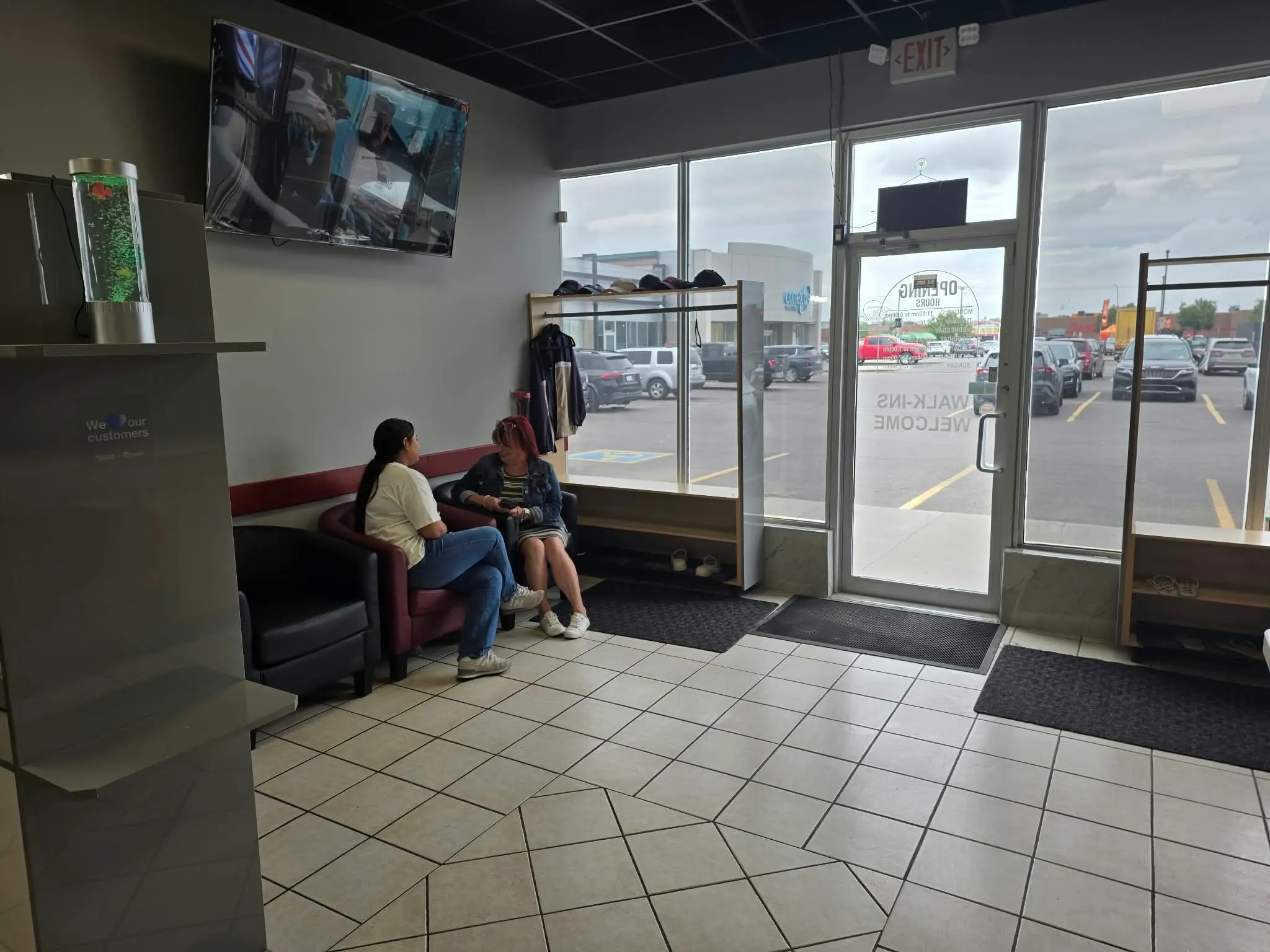 Salon entrance and seating looking out toward the parking lot